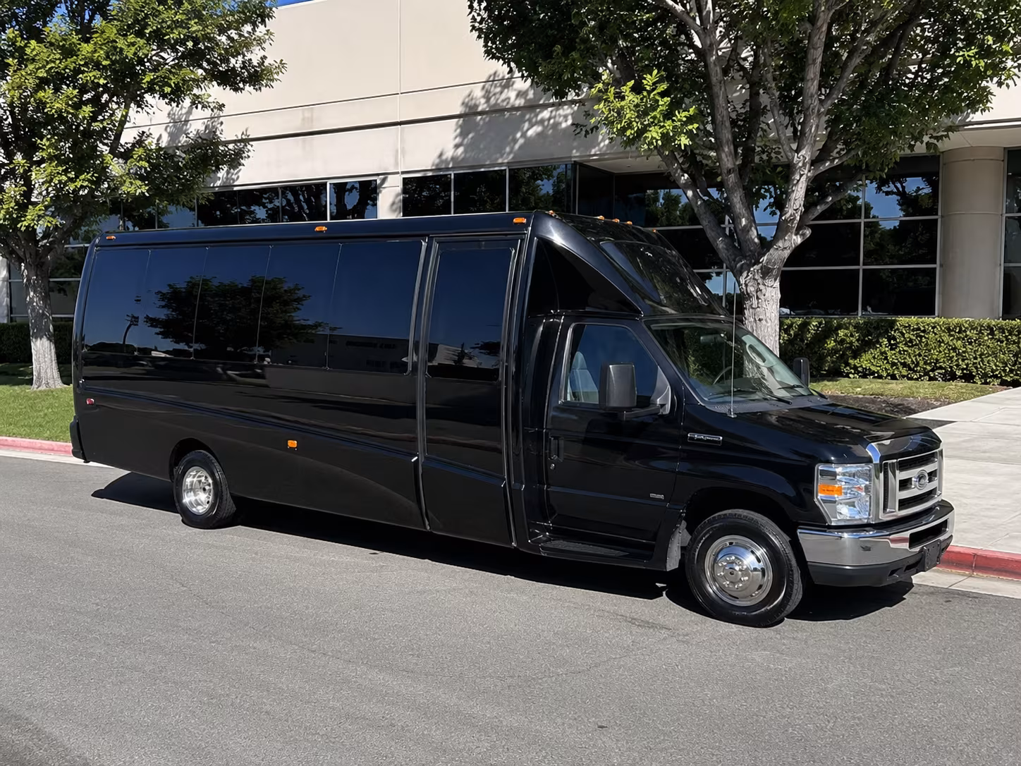 Group beside a Mercedes Sprinter limo in Murfreesboro